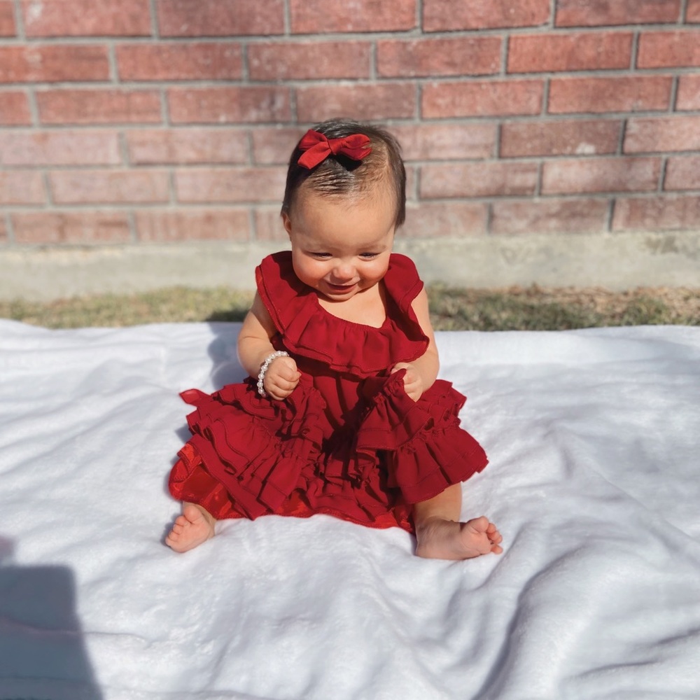 Maroon dress from Bailey’s blossom. 6-9m